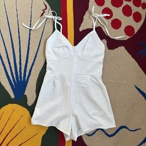 White linen romper with adjustable straps